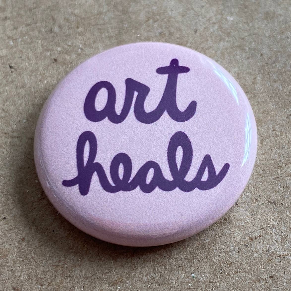 Art heals pin back button