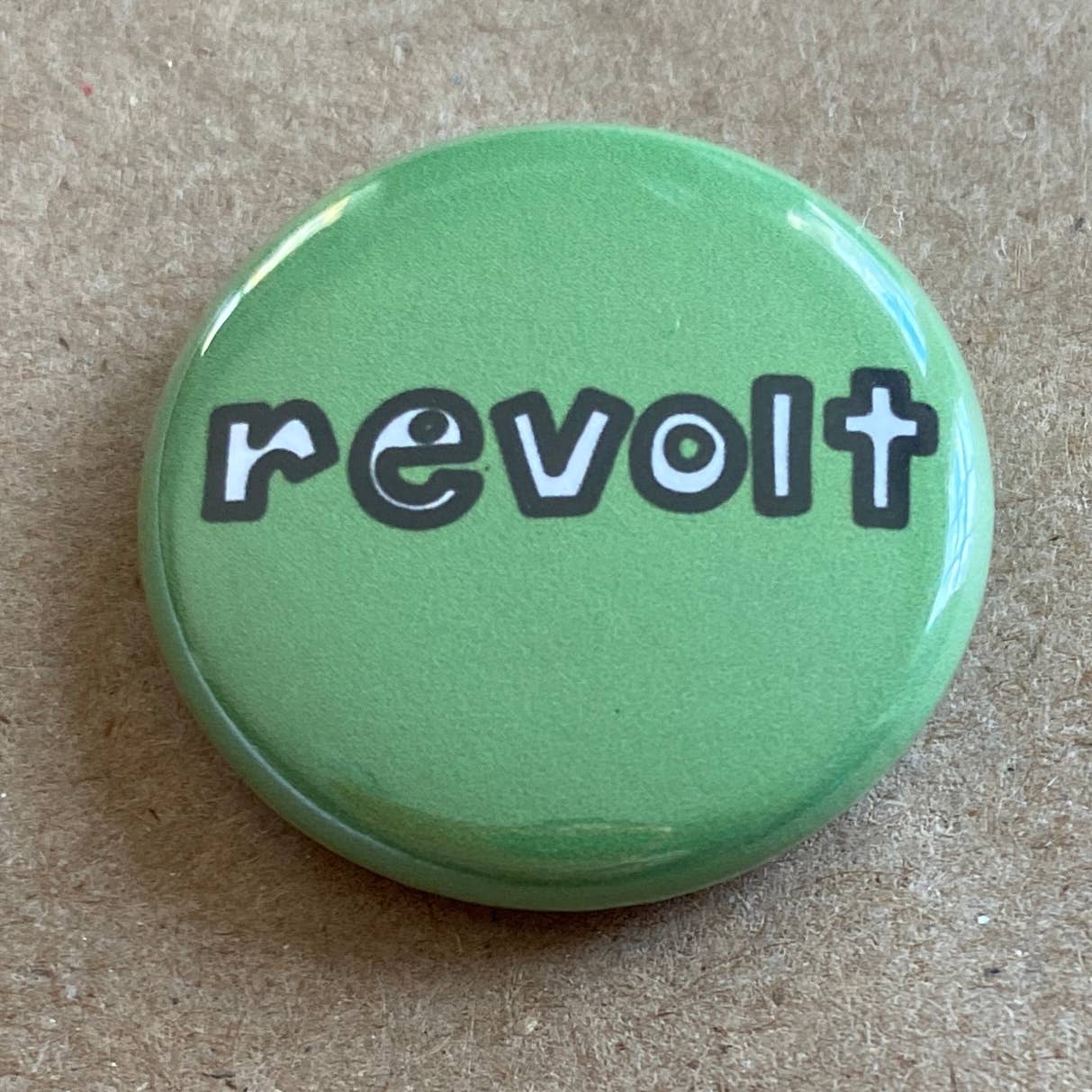 Revolt Pinback Button