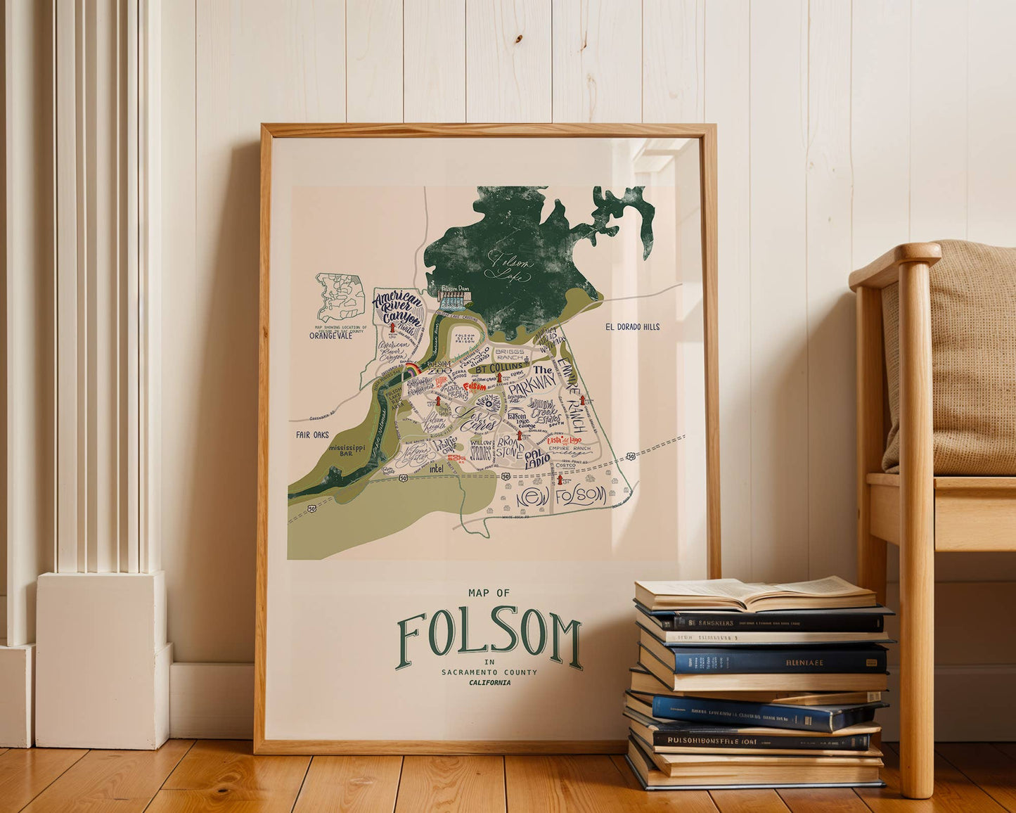 Framed map of Folsom, Ca resting on against a wall